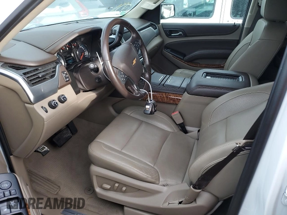 2019 Chevrolet Suburban Premier with VIN 1GNSKJKCXKR154480, listed as a Copart auction lot 77226834 with 24,683 mi miles and Non Repairable. Bid and sale history available at DreamBid. Image 7.