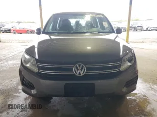 2014 Volkswagen Tiguan SE z VIN WVGAV3AX6EW542464, wystawiony jako Copart lot #84672184 z przebiegiem 144 064 mil mil oraz Czysty tytuł • Clean title. Historia ofert i sprzedaży dostępna na DreamBid. Obrazek 5.
