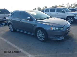 2008 Mitsubishi Lancer GTS z VIN JA3AU86U98U040291, wystawiony jako IAAI lot #41738936 z przebiegiem 175 113 mil mil oraz . Historia ofert i sprzedaży dostępna na DreamBid. Obrazek 1.