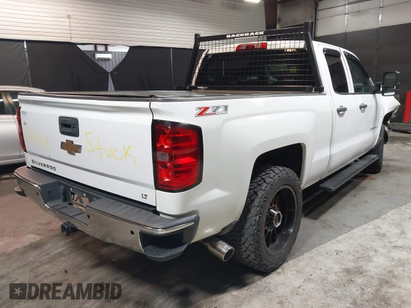 2014 Chevrolet Silverado 1500 LT with VIN 1GCVKREC0EZ116146, listed as a IAAI auction lot 41948629 with 84,777 mi miles. Bid and sale history available at carsss.com. Image 4.