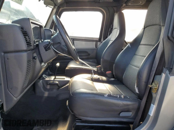2000 Jeep Wrangler SE with VIN 1J4FA29P3YP770094, listed as a Copart auction lot 65419385 with 150,364 mi miles and Clean title. Bid and sale history available at DreamBid. Image 7.