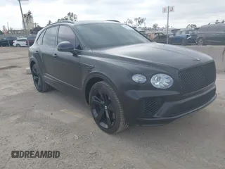 2021 Bentley Bentayga V8 z VIN SJAAM2ZV5MC038171, wystawiony jako IAAI lot #42057762 z przebiegiem 25 973 mil mil oraz . Historia ofert i sprzedaży dostępna na DreamBid. Obrazek 1.