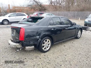 2011 Cadillac STS RWD z VIN 1G6DW6ED8B0159384, wystawiony jako IAAI lot #41840796 z przebiegiem 209 953 mil mil oraz . Historia ofert i sprzedaży dostępna na DreamBid. Obrazek 4.