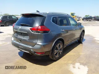 2017 Nissan Rogue SL with VIN JN8AT2MT2HW407004, listed as a IAAI auction lot 41884121 with 79,227 mi miles and . Bid and sale history available at DreamBid. Image 4.