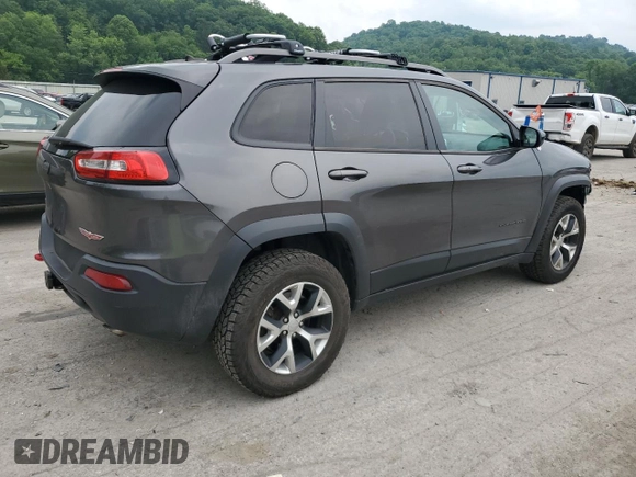 2014 Jeep Cherokee Trailhawk z VIN 1C4PJMBS9EW159721, wystawiony jako Copart lot #60719525 z przebiegiem 136 807 mil mil oraz Szkoda całkowita • Salvage title. Historia ofert i sprzedaży dostępna na DreamBid. Obrazek 3.