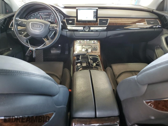 2015 Audi A8 3.0T z VIN WAU3GAFD8FN001253, wystawiony jako Copart lot #48946195 z przebiegiem 113 108 mil mil oraz Czysty tytuł • Clean title. Historia ofert i sprzedaży dostępna na DreamBid. Obrazek 8.
