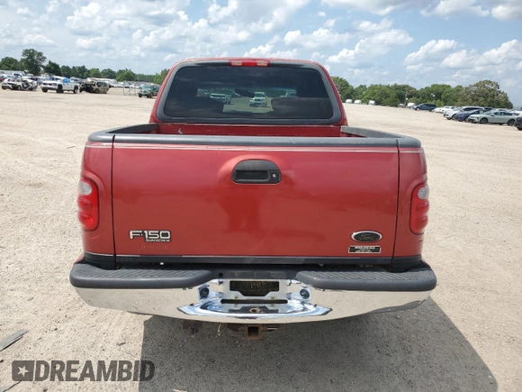 2001 Ford F-150 XLT with VIN 1FTRW076X1KC42302, listed as a Copart auction lot 59868295 with 234,772 mi miles and Salvage title. Bid and sale history available at DreamBid. Image 6.