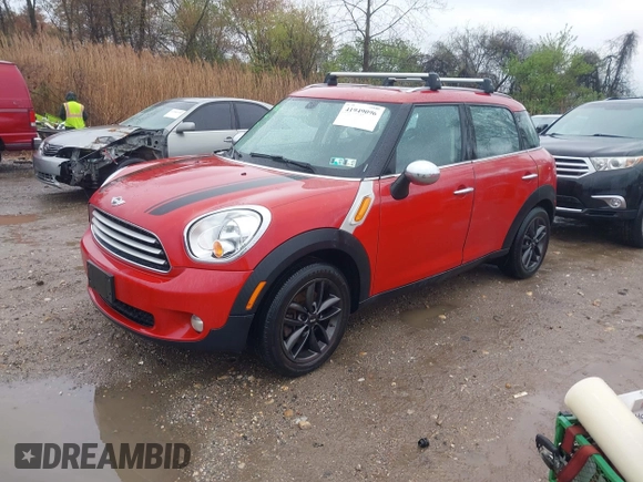 2014 MINI Countryman with VIN WMWZB3C53EWM32495, listed as a IAAI auction lot 41949096 with 161,524 mi miles and . Bid and sale history available at DreamBid. Image 2.