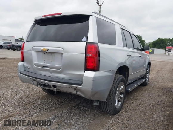 2019 Chevrolet Tahoe LT z VIN 1GNSCBKC1KR191789, wystawiony jako IAAI lot #42144961 z przebiegiem 94 178 mil mil oraz . Historia ofert i sprzedaży dostępna na DreamBid. Obrazek 4.