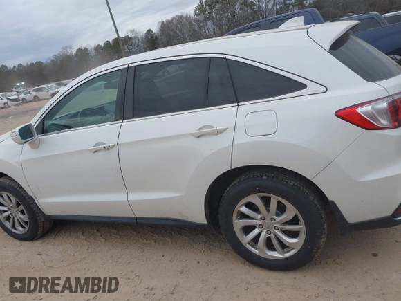 2016 Acura RDX with VIN 5J8TB4H3XGL029013, listed as a IAAI auction lot 41452976 with 131,932 mi miles. Bid and sale history available at carsss.com. Image 15.