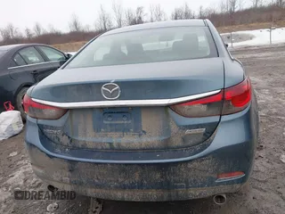 2014 Mazda 6 i Touring with VIN JM1GJ1T53E1112768, listed as a IAAI auction lot 41727440 with 166,081 mi miles and . Bid and sale history available at DreamBid. Image 17.