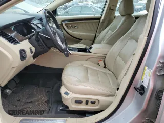 2013 Ford Taurus Limited z VIN 1FAHP2J89DG141683, wystawiony jako Copart lot #52462575 z przebiegiem 77 235 mil mil oraz Czysty tytuł • Clean title. Historia ofert i sprzedaży dostępna na DreamBid. Obrazek 7.