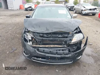 2010 Ford Fusion Hybrid with VIN 3FADP0L38AR263525, listed as a IAAI auction lot 41952084 with 112,681 mi miles. Bid and sale history available at carsss.com. Image 6.