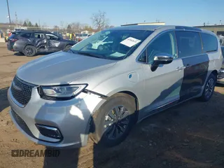 2023 Chrysler Pacifica Hybrid Limited with VIN 2C4RC1S72PR588627, listed as a IAAI auction lot 42063631 with 52,799 mi miles and . Bid and sale history available at DreamBid. Image 2.