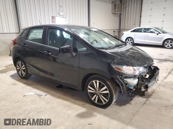 2015 Honda Fit EX with VIN 3HGGK5G86FM725059, listed as a Copart auction lot 55472275 with 63,096 mi miles and Salvage title. Bid and sale history available at DreamBid. Image 4.