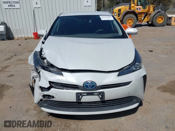 2021 Toyota Prius L Eco with VIN JTDKAMFU8M3133925, listed as a IAAI auction lot 41966660 with 115,193 mi miles. Bid and sale history available at carsss.com. Image 12.