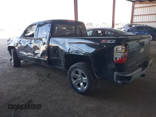 2014 Chevrolet Silverado 1500 LTZ with VIN 1GCVKSEC9EZ165028, listed as a IAAI auction lot 41444111 with 121,929 mi miles and . Bid and sale history available at DreamBid. Image 3.
