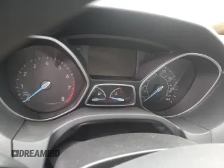 2018 Ford Focus SE z VIN 1FADP3FE6JL227653, wystawiony jako Copart lot #56827585 z przebiegiem Nie podano mil oraz Szkoda całkowita • Salvage title. Historia ofert i sprzedaży dostępna na DreamBid. Obrazek 9.