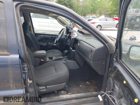 2004 Jeep Grand Cherokee Laredo z VIN 1J4GW48S94C363700, wystawiony jako IAAI lot #42372081 z przebiegiem Nie podano mil oraz . Historia ofert i sprzedaży dostępna na DreamBid. Obrazek 5.
