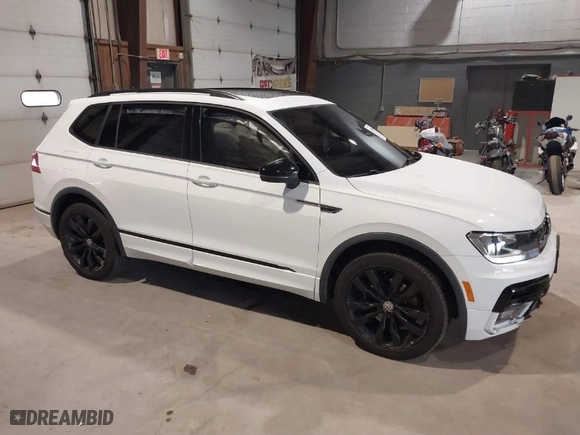2020 Volkswagen Tiguan SE with VIN 3VV2B7AX1LM106600, listed as a IAAI auction lot 40259436 with 56,736 mi miles. Bid and sale history available at carsss.com. Image 1.