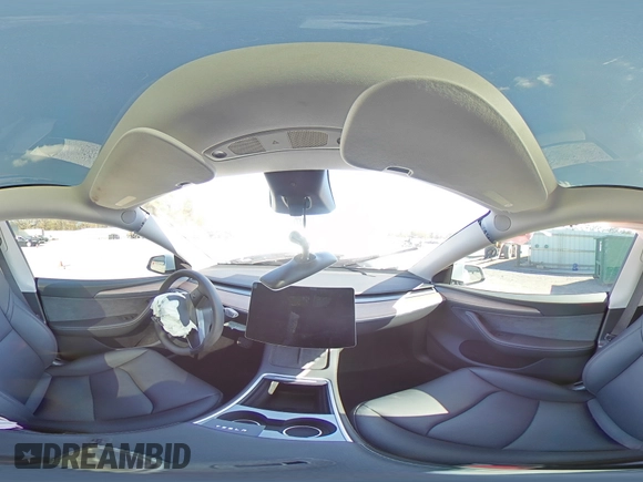2025 Tesla Model Y Long Range with VIN 7SAYGDED3SA339079, listed as a Copart auction lot 82041424 with 1,793 mi miles and Salvage Title. Bid and sale history available at DreamBid. Image 12.