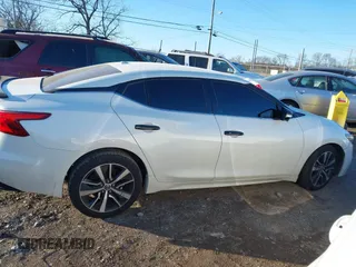 2018 Nissan Maxima SV with VIN 1N4AA6AP7JC372246, listed as a IAAI auction lot 41387139 with 104,686 mi miles and . Bid and sale history available at DreamBid. Image 13.