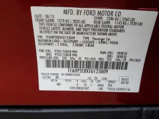 2014 Ford Taurus SEL with VIN 1FAHP2E8XEG123009, listed as a Copart auction lot 42724724 with 117,639 mi miles and Salvage Title. Bid and sale history available at DreamBid. Image 14.