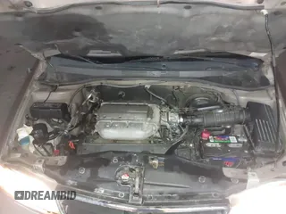 2003 Honda Odyssey EX-L with VIN 5FNRL18923B117592, listed as a IAAI auction lot 41546119 with 212,755 mi miles and . Bid and sale history available at DreamBid. Image 10.