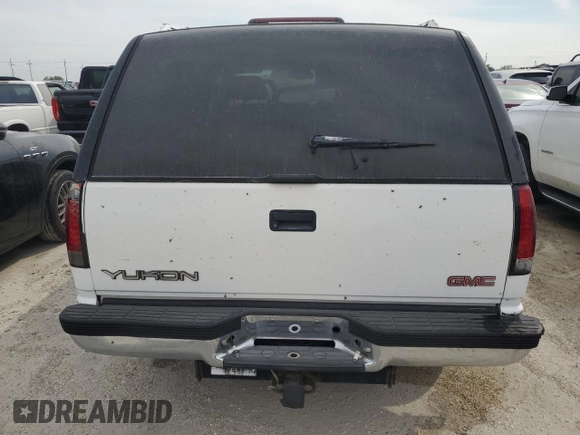 1998 GMC Yukon with VIN 1GKEK13R9WJ711087, listed as a Copart auction lot 73795594 with 177,708 mi miles and Non Repairable. Bid and sale history available at carsss.com. Image 6.