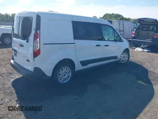 2018 Ford Transit Connect XLT z VIN NM0LS7F76J1377283, wystawiony jako IAAI lot #42222008 z przebiegiem 140 667 mil mil oraz . Historia ofert i sprzedaży dostępna na DreamBid. Obrazek 4.