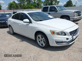 2014 Volvo S60 T5 z VIN YV1612FSXE2277644, wystawiony jako IAAI lot #42405453 z przebiegiem Nie podano mil oraz . Historia ofert i sprzedaży dostępna na DreamBid. Obrazek 1.