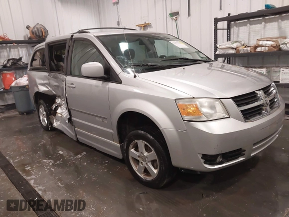 2010 Dodge Grand Caravan SXT with VIN 2D4RN5D15AR261319, listed as a IAAI auction lot 41877022 with 142,292 mi miles and . Bid and sale history available at DreamBid. Image 1.