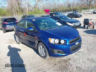2014 Chevrolet Sonic LT with VIN 1G1JC5SH6E4164809, listed as a IAAI auction lot 42006407 with 105,710 mi miles and . Bid and sale history available at DreamBid. Image 1.