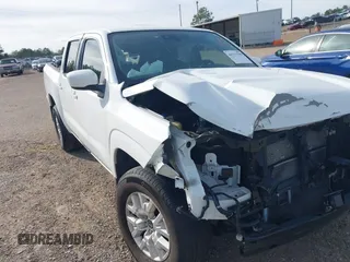 2022 Nissan Frontier SV z VIN 1N6ED1EJ2NN644012, wystawiony jako IAAI lot #41737789 z przebiegiem 25 856 mil mil oraz . Historia ofert i sprzedaży dostępna na DreamBid. Obrazek 18.