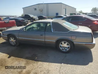 1998 Cadillac Eldorado z VIN 1G6EL12YXWU610918, wystawiony jako Copart lot #57309075 z przebiegiem 168 228 mil mil oraz Szkoda całkowita • Salvage title. Historia ofert i sprzedaży dostępna na DreamBid. Obrazek 2.