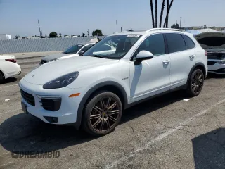 2015 Porsche Cayenne S E-Hybrid with VIN WP1AE2A24FLA50942, listed as a Copart auction lot 58265285 with 158,623 mi miles and Salvage title. Bid and sale history available at DreamBid. Image 1.