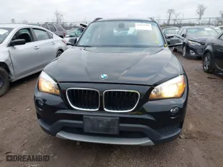 2014 BMW X1 xDrive28i with VIN WBAVL1C5XEVY16666, listed as a IAAI auction lot 41924589 with 98,731 mi miles. Bid and sale history available at carsss.com. Image 13.