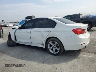 2015 BMW 3 Series 328i with VIN WBA3A5C56FF606517, listed as a Copart auction lot 59388115 with 185,684 mi miles and Salvage title. Bid and sale history available at DreamBid. Image 2.