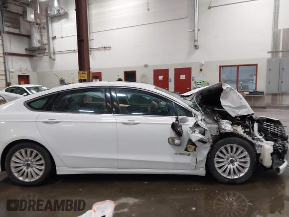 2015 Ford Fusion SE Hybrid with VIN 3FA6P0LU1FR225241, listed as a IAAI auction lot 42349797 with 85,725 mi miles and . Bid and sale history available at DreamBid. Image 12.