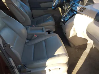 2012 Honda Odyssey Touring z VIN 5FNRL5H9XCB067841, wystawiony jako IAAI lot #40631672 z przebiegiem 210 237 mil mil oraz . Historia ofert i sprzedaży dostępna na DreamBid. Obrazek 5.