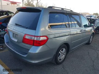 2005 Honda Odyssey EX-L with VIN 5FNRL38775B030316, listed as a IAAI auction lot 41670853 with 183,359 mi miles. Bid and sale history available at carsss.com. Image 4.