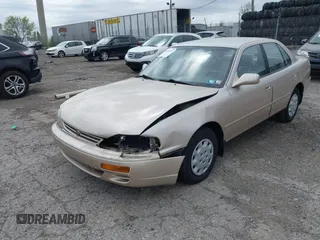 1996 Toyota Camry DX with VIN 4T1BG12K7TU813773, listed as a IAAI auction lot 42084977 with 49,453 mi miles. Bid and sale history available at carsss.com. Image 6.