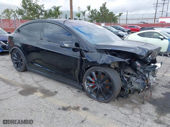 2020 Tesla Model X Long Range with VIN 5YJXCBE22LF283325, listed as a IAAI auction lot 41713545 with NaN miles. Bid and sale history available at carsss.com. Image 1.