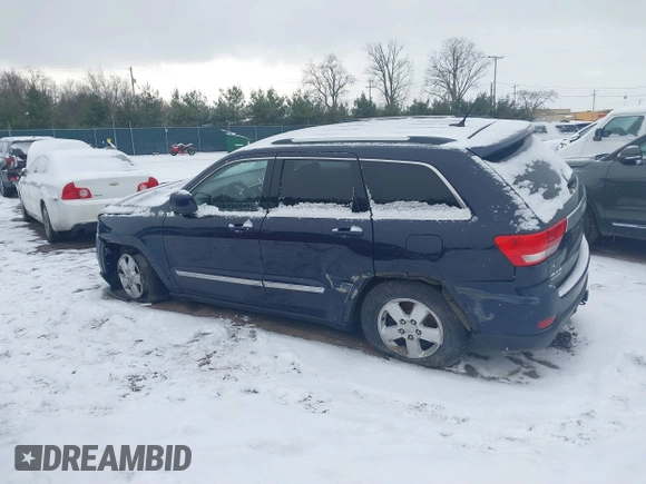 2013 Jeep Grand Cherokee Laredo with VIN 1C4RJFAGXDC542987, listed as a IAAI auction lot 41262770 with 199,273 mi miles. Bid and sale history available at carsss.com. Image 13.