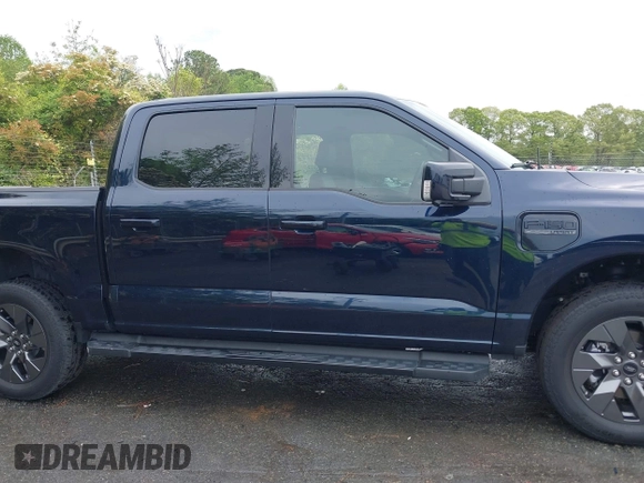 2023 Ford F-150 Lightning Pro with VIN 1FTVW1EL7PWG11924, listed as a IAAI auction lot 41991819 with 20,450 mi miles and . Bid and sale history available at DreamBid. Image 14.