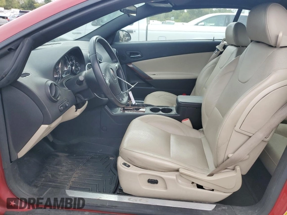 2006 Pontiac G6 with VIN 1G2ZH368564274587, listed as a Copart auction lot 72696594 with 156,311 mi miles and Salvage title. Bid and sale history available at DreamBid. Image 7.