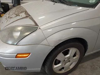 2004 Ford Focus ZX5 with VIN 3FAHP37314R110616, listed as a IAAI auction lot 42581804 with 94,252 mi miles and . Bid and sale history available at DreamBid. Image 6.