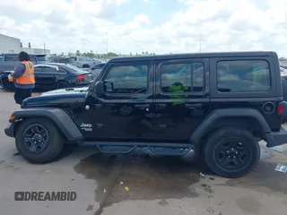 2019 Jeep Wrangler Unlimited Sport S with VIN 1C4HJXDG9KW653488, listed as a IAAI auction lot 42275297 with Not provided miles and . Bid and sale history available at DreamBid. Image 14.