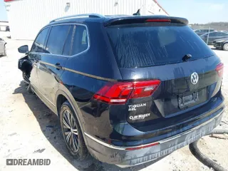 2018 Volkswagen Tiguan SEL with VIN 3VV3B7AX2JM165849, listed as a IAAI auction lot 41827856 with 114,238 mi miles. Bid and sale history available at carsss.com. Image 3.