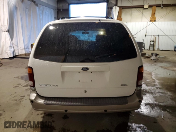 2003 Ford Windstar SEL z VIN 2FMZA53423BA17185, wystawiony jako Copart lot #82034114 z przebiegiem 64 807 mil mil oraz Szkoda całkowita • Salvage title. Historia ofert i sprzedaży dostępna na DreamBid. Obrazek 6.
